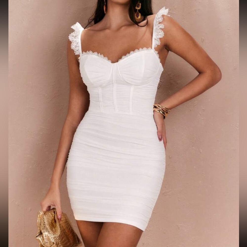 White mini dress with lace bralette. Size medium.